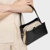 Small TOUS Kaos Icon city bag in black Bags